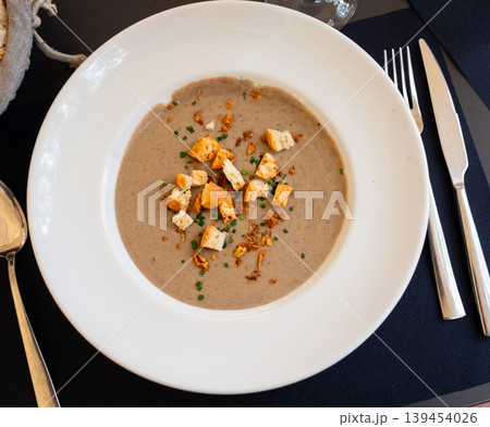 Hot mushroom cream soup of champignons 139454026