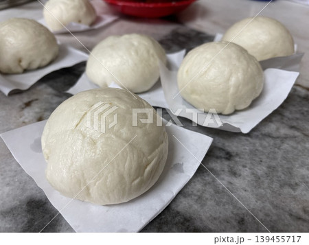 Freshly Steamed Handmade Baozi Buns Served On Table Freshly Steamed Handmade Baozi Buns Served On Table 139455717