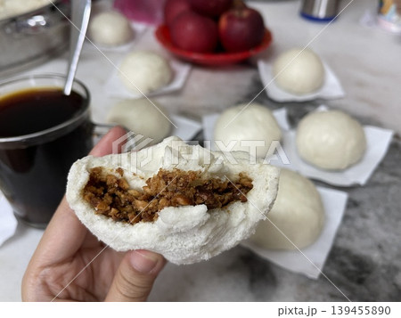 Half Eaten Handmade Steamed Baozi Bun With Sweet Peanut Filling 139455890
