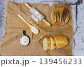 Baking ingredients with rolling pin, flour, and sliced bread 139456233