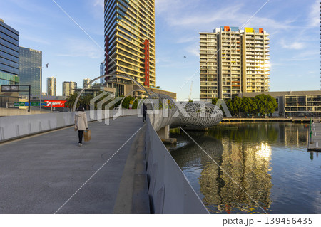 Melbourne, Australia - July 7, 2024 : Webb Bridge and Yarra river in South Melbourne, Australia on July 7, 2024. The Webb Bridge is a pedestrian bridge over the Yarra River. Melbourne, Australia - July 7, 2024 : Webb Bridge and Yarra river in South Melbourne, Australia on July 7, 2024. The Webb Bridge is a pedestrian bridge over the Yarra River. 139456435