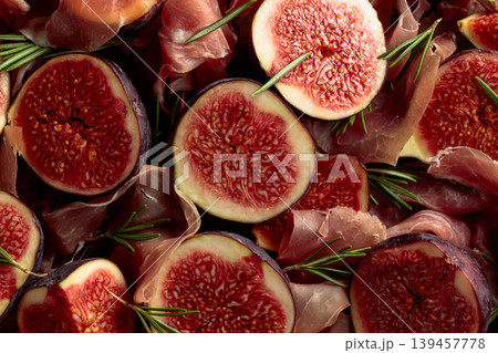 Prosciutto with rosemary and fig fruit. 139457778
