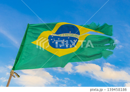 Brazilian flag with blue sky background Rio de Janeiro Brazil. 139458186