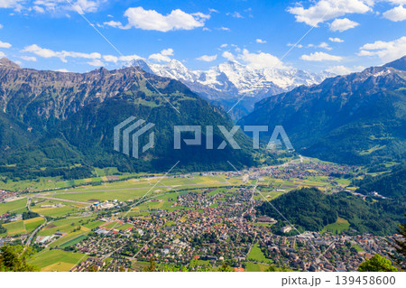 Breathtaking aerial view of Interlaken and Swiss Alps from Harder Kulm viewpoint, Switzerland Breathtaking aerial view of Interlaken and Swiss Alps from Harder Kulm viewpoint, Switzerland 139458600