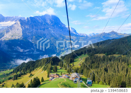 Overhead cable car to First mountain, Grindelwald, Switzerland Overhead cable car to First mountain, Grindelwald, Switzerland 139458683