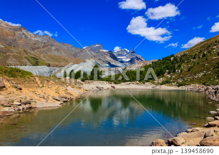 View of Grunsee lake (Green Lake) and the Swiss Alps at summer on the Five Lakes Trail in Zermatt, Switzerland 139458690