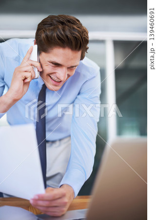 Business man, phone call and reading laptop, documents and paperwork for planning, accounting and financial advice. Professional worker talking on mobile and computer information or taxes management Business man, phone call and reading laptop, documents and paperwork for planning, accounting and financial advice. Professional worker talking on mobile and computer information or taxes management 139460691
