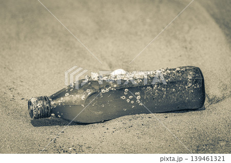 Plastic bottle stranded washed up garbage pollution on beach Brazil. Plastic bottle stranded washed up garbage pollution on beach Brazil. 139461321