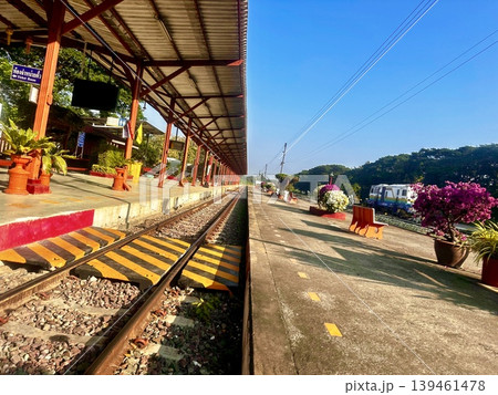 Half and half ratio of train station scene for background concept with Wide angle perspective capturing peaceful travel, transit, and Southeast Asian architecture. Half and half ratio of train station scene for background concept with Wide angle perspective capturing peaceful travel, transit, and Southeast Asian architecture. 139461478