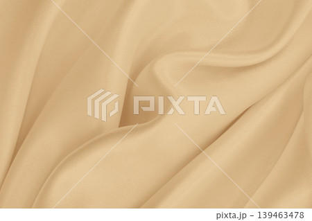 Smooth elegant golden silk or satin luxury cloth texture as wedding background. Luxurious background design. In Sepia toned. Retro style Smooth elegant golden silk or satin luxury cloth texture as wedding background. Luxurious background design. In Sepia toned. Retro style 139463478