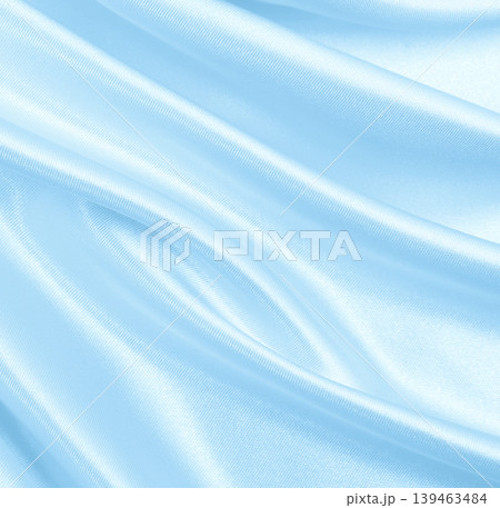 Smooth elegant blue silk or satin luxury cloth texture as abstract background. Luxurious background design Smooth elegant blue silk or satin luxury cloth texture as abstract background. Luxurious background design 139463484