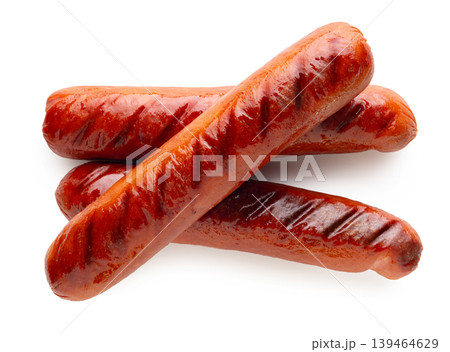 Appetizing fried sausages close-up on a white isolated background Appetizing fried sausages close-up on a white isolated background 139464629