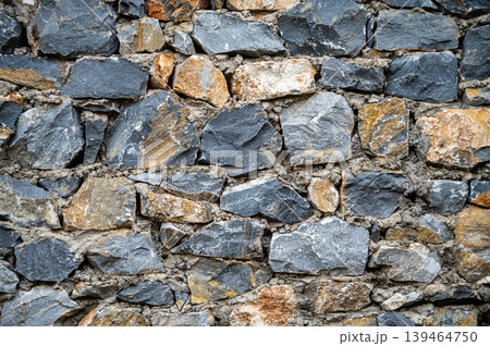 Stone wall structure in Skopje, North Macedonia with diverse rock shapes and colors Stone wall structure in Skopje, North Macedonia with diverse rock shapes and colors 139464750
