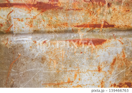 Rough metal surface covered in rust with organic abstract patterns. Works for design textures, artistic backgrounds, and industrial styling. Rough metal surface covered in rust with organic abstract patterns. Works for design textures, artistic backgrounds, and industrial styling. 139466763