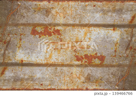 Rough metal surface covered in rust with organic abstract patterns. Works for design textures, artistic backgrounds, and industrial styling. Rough metal surface covered in rust with organic abstract patterns. Works for design textures, artistic backgrounds, and industrial styling. 139466766