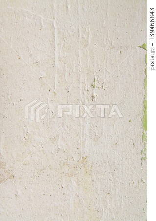 Close-up of wall plaster being smoothed during repair preparation. Suitable for renovation themes, building materials, and interior maintenance visuals. Close-up of wall plaster being smoothed during repair preparation. Suitable for renovation themes, building materials, and interior maintenance visuals. 139466843