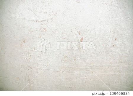 Rough plaster texture on wall during repair stage in interior space. Works for home improvement themes, construction backgrounds, and material detail shots. Rough plaster texture on wall during repair stage in interior space. Works for home improvement themes, construction backgrounds, and material detail shots. 139466884