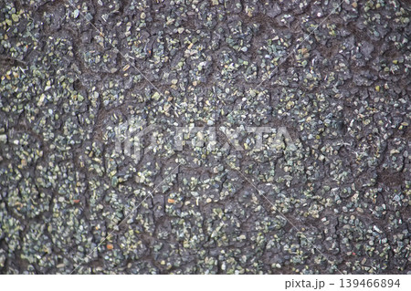 Flexible roofing felt material arranged on roof surface during repair. Ideal for renovation themes, contractor work, and building maintenance. Flexible roofing felt material arranged on roof surface during repair. Ideal for renovation themes, contractor work, and building maintenance. 139466894