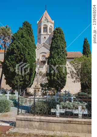 cypress trees frame the cemetery of Lerins Abbey cypress trees frame the cemetery of Lerins Abbey 139468054