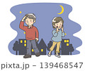 夜道で徘徊する家族を探し不安な表情を浮かべる男女 介護の悩み 139468547