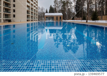 Outdoor swimming pool with clear blue water Outdoor swimming pool with clear blue water 139469577