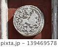 ancient wall bas-relief depicting a lion 139469578