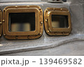 old brass portholes 139469582