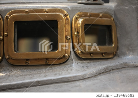 old brass portholes 139469582