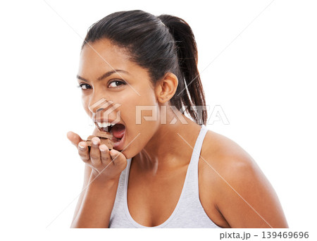 Portrait, diet and woman with chocolate, eating and wellness isolated on a white studio background. Face, person and model with candy, hungry and unhealthy snack with mockup space, nutrition and food Portrait, diet and woman with chocolate, eating and wellness isolated on a white studio background. Face, person and model with candy, hungry and unhealthy snack with mockup space, nutrition and food 139469696