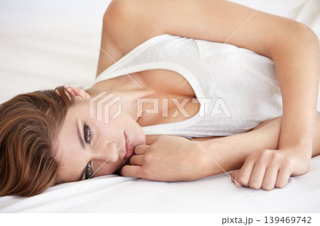 Relax, thinking and a young woman on a bed in her home to wake up in the morning with an idea. Rest, vision and pajamas with a feminine person in the bedroom of her apartment for weekend chilling Relax, thinking and a young woman on a bed in her home to wake up in the morning with an idea. Rest, vision and pajamas with a feminine person in the bedroom of her apartment for weekend chilling 139469742