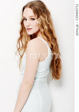 Fashion, dress and serious portrait of woman in white background of studio with confidence. Model, profile and person with pride in trendy, formal style and lady in outfit with hairstyle and beauty 139469752