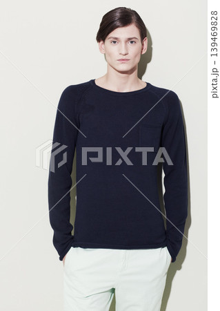 Serious man, model and portrait with fashion, modern style and cool outfit in studio. Male person, gen z and stylish clothes with confidence and fashionable student with white background and trendy Serious man, model and portrait with fashion, modern style and cool outfit in studio. Male person, gen z and stylish clothes with confidence and fashionable student with white background and trendy 139469828
