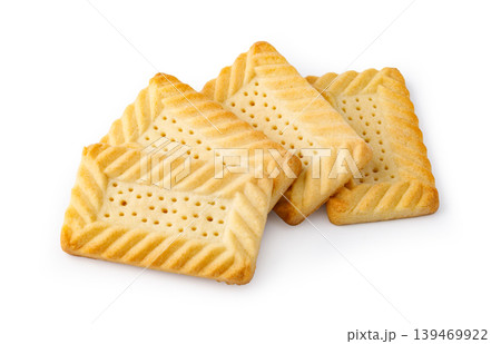 Square butter cookies with decorative edges on white background Square butter cookies with decorative edges on white background 139469922