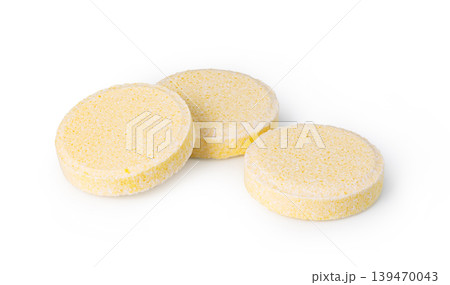 Yellow effervescent tablets representing health and immunity support Yellow effervescent tablets representing health and immunity support 139470043