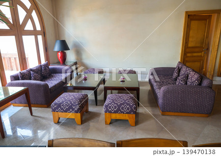 Comfortable chairs, sofas and tables in the hotel lobby Comfortable chairs, sofas and tables in the hotel lobby 139470138