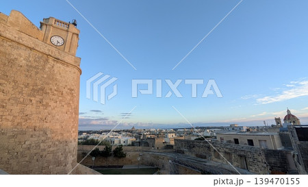 Cityscape seen from a hilltop fortress in the evening in Gozo 139470155