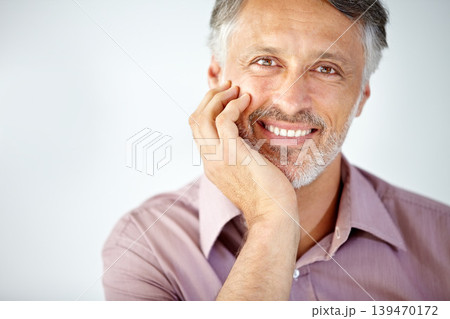 Smile, portrait and mature businessman in a studio with positive, good and confident attitude. Happy, career and face of professional male lawyer with legal career isolated by gray background. 139470172