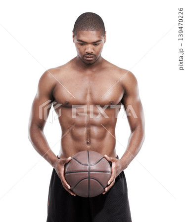 Man, basketball player and shirtless for training, serious and standing on white background, confident and game. Studio backdrop, thinking and sportsman for exercise, health and active athlete 139470226