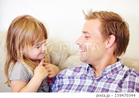 Smile, conversation and father with child on a sofa relaxing, talking and bonding together. Happy, love and young dad speaking to sweet girl kid from Australia in the living room of modern home. Smile, conversation and father with child on a sofa relaxing, talking and bonding together. Happy, love and young dad speaking to sweet girl kid from Australia in the living room of modern home. 139470344