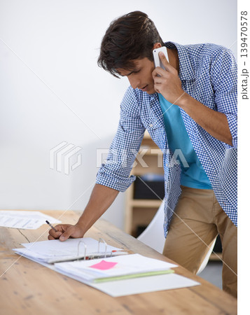 Business man, phone call and planning with documents, folder or paperwork for accounting and financial advice. Professional worker talking on his mobile for startup information and taxes management 139470578