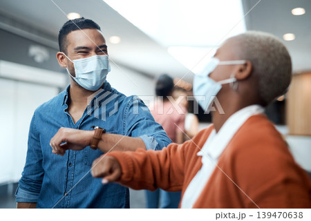 Business, face mask or team at seminar with elbow bump, greeting or virus protection at conference. Hello, people or employees with health compliance, disease prevention or pandemic safety at event. Business, face mask or team at seminar with elbow bump, greeting or virus protection at conference. Hello, people or employees with health compliance, disease prevention or pandemic safety at event. 139470638