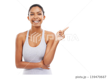 Pointing up, exercise and woman with promotion, portrait and wellness isolated on a white studio background. Person, hand gesture or model with decision, options and choice with sports or opportunity 139470687