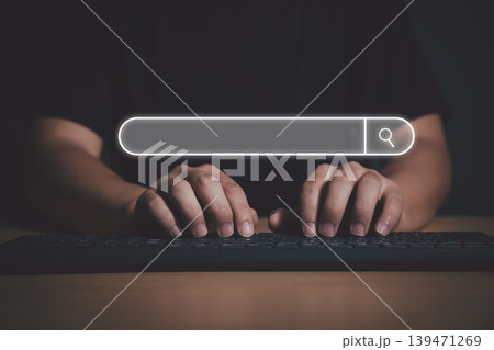 Man's hands are using a computer keyboard to Searching for information via big data search engine. Data Search Technology Search Engine Optimization. 139471269