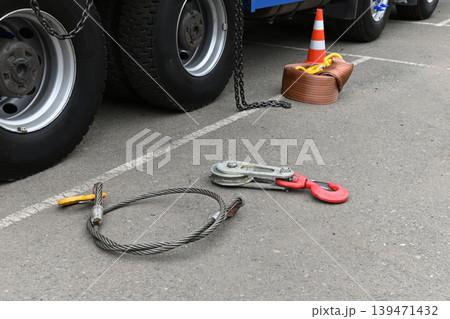 Tools for towing parked vehicle in city area Tools for towing parked vehicle in city area 139471432