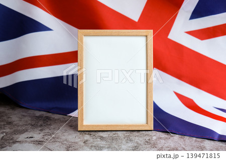 Empty white paper frame National symbol of Great Britain. Mock up advertisement template British wave UK fabric flag background. Copy space for your text. Independence 139471815