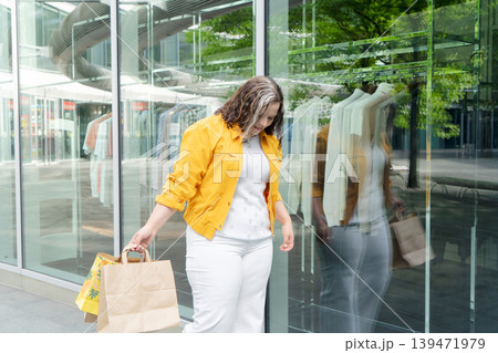 Happy woman shopping 139471979