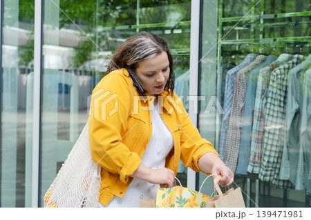 Happy woman shopping 139471981