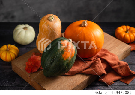 Orange pumpkins, dark moody background, autumn concept 139472089