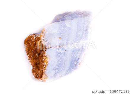 Macro mineral blue agate in the rock on white background Macro mineral blue agate in the rock on white background 139472153