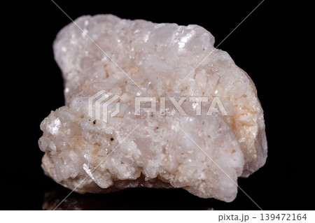 Macro mineral stone Amphibolite in quartz on black background Macro mineral stone Amphibolite in quartz on black background 139472164